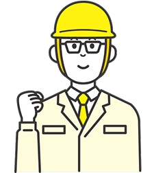 拳を握る元気な建設作業着の男性のイメージ